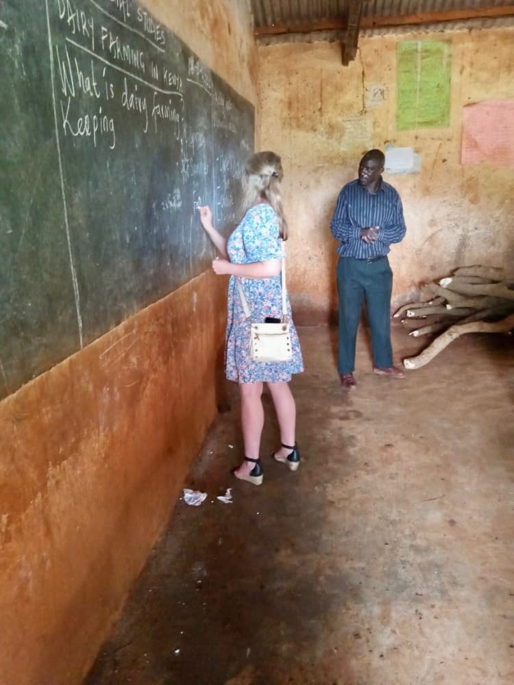 Teacher with students